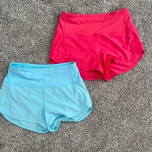 LULULEMON Speed Up High Rise 2.5 shorts in pink and light blue. EUC! Size 4.